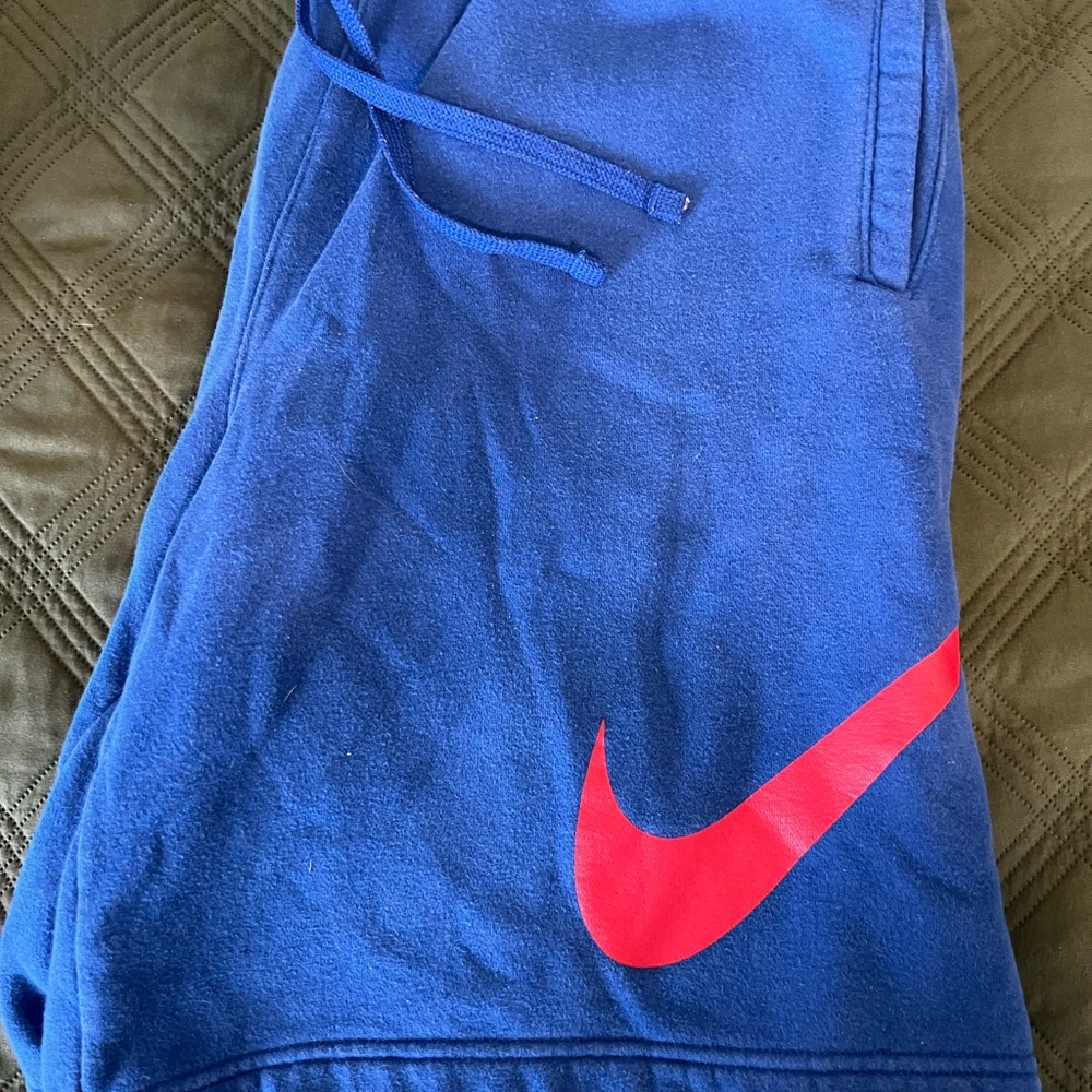 Nike Men’s Blue Fleece Bottoms with Red Swoosh